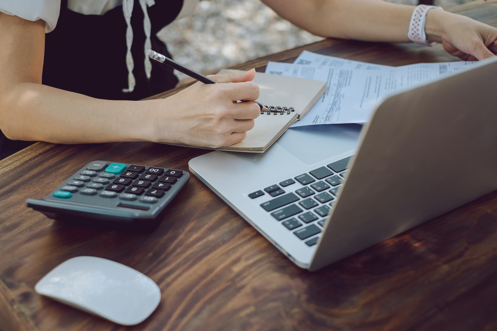 dealing-with-debt-close-up-of-money-looking-for-debt-help