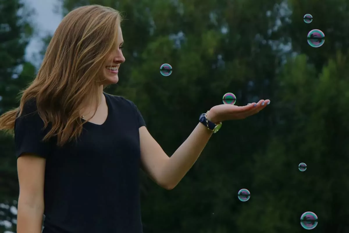bubbles woman holding bubbles