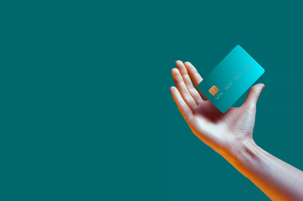 Close,Up,Female,Hand,Holds,Levitating,Template,Mockup,Bank,Credit Consumer Proposal vs Bankruptcy